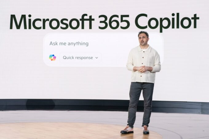 AI leaders in a meeting, discussing future of work.