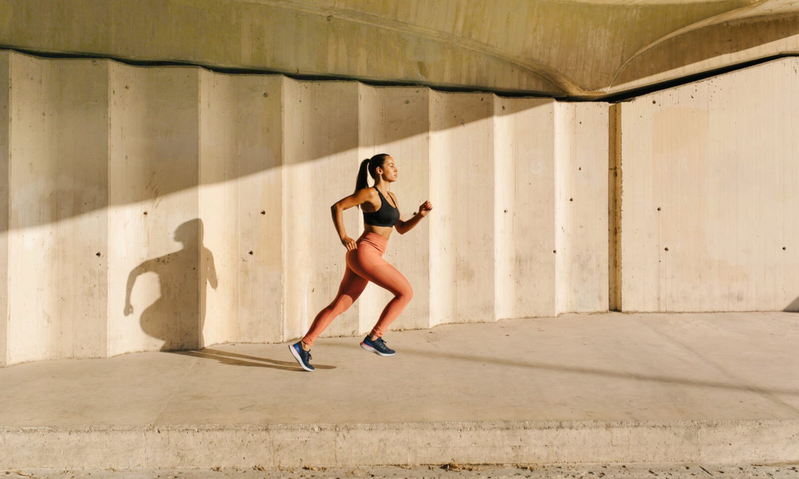 Woman performing an exercise, symbolizing the power of movement for health