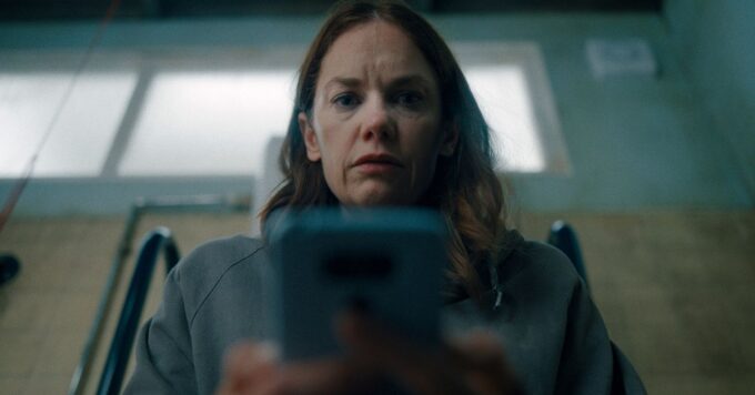 Apple TV logo with a TV screen in the background