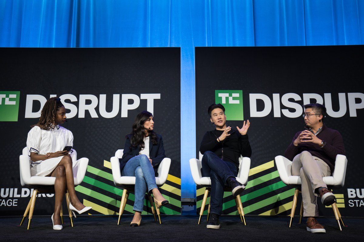 Investors at TechCrunch Disrupt discussing AI trends.