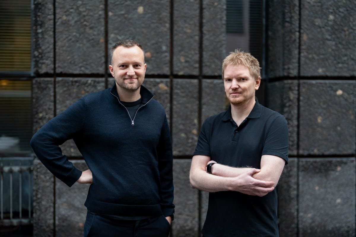 Alt text for the image: "Birds flying near wind turbines"