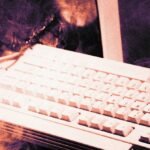 A digital representation of a lock with binary code flowing around it, symbolizing cybersecurity and data breaches.