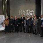 الصورة توضح التوافق بين Marsa Maroc والعمال، ويظهر كيف يمكن للشركات أن تحقق أهدافها من خلال العمل مع العمال.