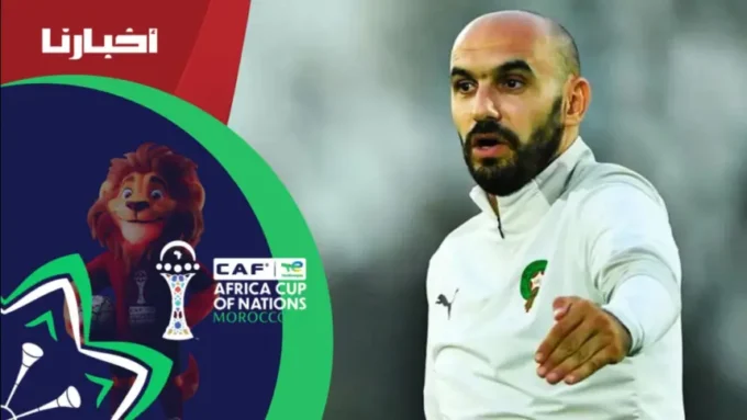 رجل يلعب كرة القدم مع جماهيره.