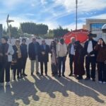 مجموعة من النساء يشاركن في فعالية توعية ضد العنف الرقمي.