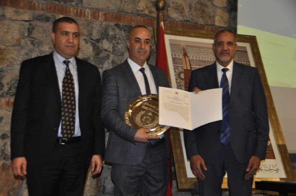 ** حفل تسليم جوائز الاستحقاق بمراكش، قضاة وضباط وموظفين يتلقون جوائزهم.