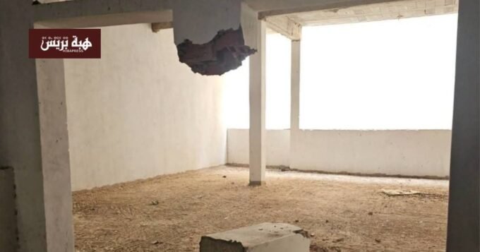 صورة لكراج في مدينة ميدلت مع علامات على خروقات