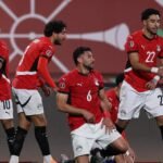 صورة ل محمد صلاح يؤدي تسديدة في مباراة كأس الأمم الإفريقية.