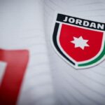 صورة لمنتخب النشامى يرتدي الألوان الوطنية.