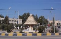 صورة لقاء تنسيقي بين متصرف لواء المزار الجنوبي ومديري الدوائر الحكومية.