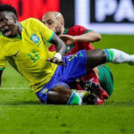 وصف الصورة بالإنجليزية: "إقبال الجماهير على المباريات الرياضية في مونديال 2026".