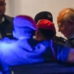 صورة رئيس الوزراء السابق نجيب رزاق.