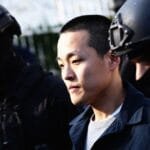 Do Kwon in court, escorted by US Marshals.