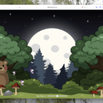 Kids sitting quietly in a classroom with a laptop in front of them.