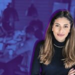 A diverse group of professional Latina women collaborating in a modern office setting, symbolizing innovation and cultural leadership.