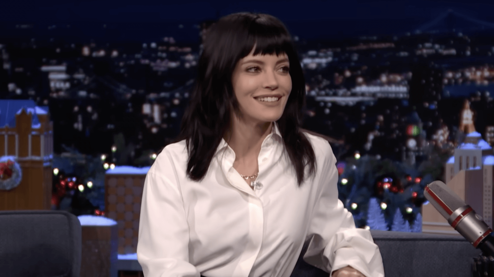 Lily Allen performing on stage