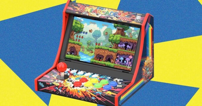 iMP Tech Mini Arcade Pro with Nintendo Switch inserted, showcasing its arcade cabinet design and joystick.