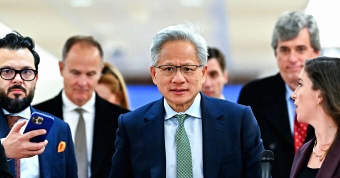 Nvidia CEO Jensen Huang with Nemotron 3 models