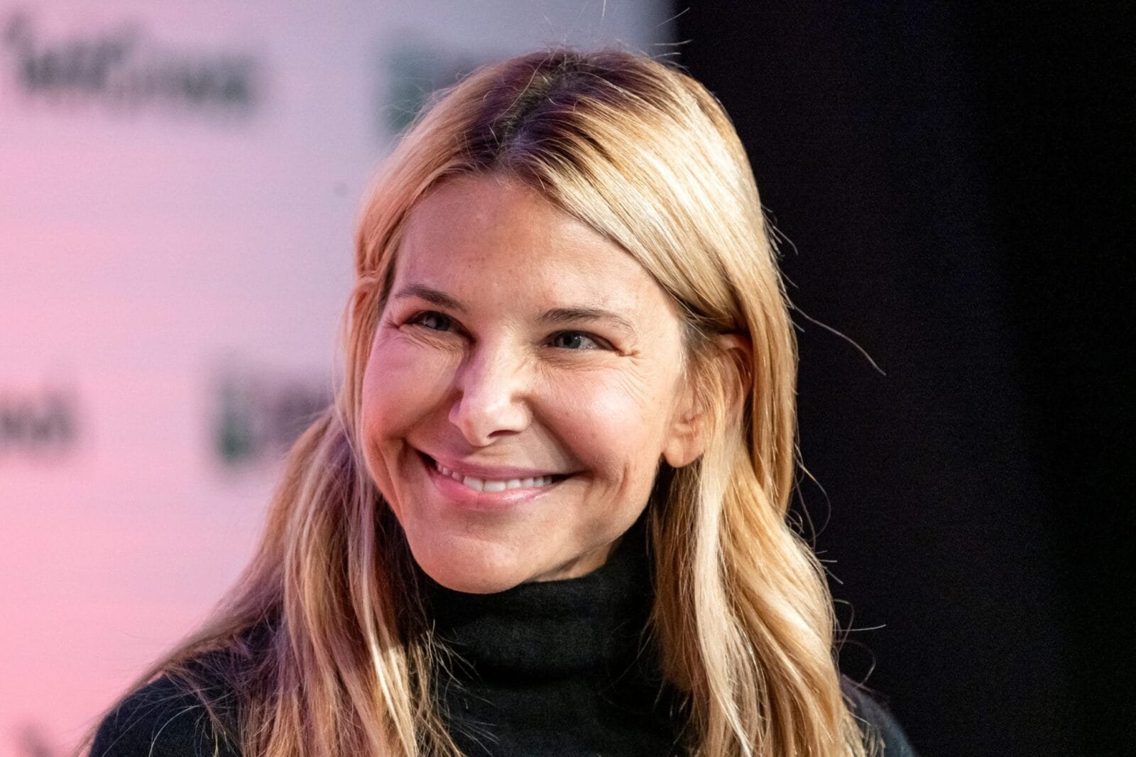 A photo of OpenAI's headquarters in San Francisco, with a cityscape in the background.