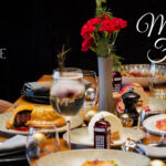 Un cadre élégant et festif de l'hôtel Radisson Gauthier – La Citadelle, avec des plats gastronomiques et des retransmissions de matchs de la CAN.