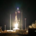 Rocket Lab's logo and a satellite in space