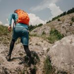 Weighted backpack on a hiker's back