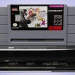 Epilogue SN Operator USB dock connected to a computer, displaying an SNES game on screen.