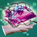 A person writing a handwritten note in a notebook.