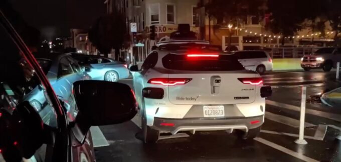 Waymo robotaxi stalled on city streets