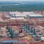 The AI Energy Paradox: Data Centers Fuel a Global Gas Resurgence, Threatening Climate Goals 8 Gas turbines under construction at the Stargate AI data center in Abilene, Texas, highlighting the reliance on natural gas for AI infrastructure.