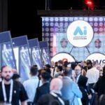 Attendees at AI Everything MEA Egypt 2026 interacting with advanced AI systems and exhibits.