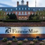 An AI-generated image of Donald Trump's voice waveform over a backdrop of houses, symbolizing the intersection of technology and housing policy.