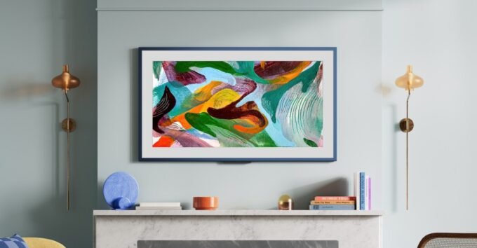 The Amazon Ember Artline TV displaying artwork in a modern living room setting.