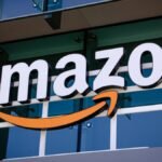 Unlocking Your Share: Billions in Amazon Settlements Await U.S. Customers 6 A graphic illustrating Amazon's logo with money or a refund symbol, representing the recent settlements.