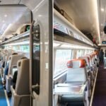 Interior view of Amtrak NextGen Acela train, showing both Business and First Class cabins.