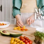 A vibrant assortment of anti-inflammatory foods including berries, leafy greens, olive oil, and spices, promoting brain health and cognitive function.