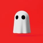 Screenshot of the 'Are You Dead Yet?' app interface with a large green check-in button and its developers.