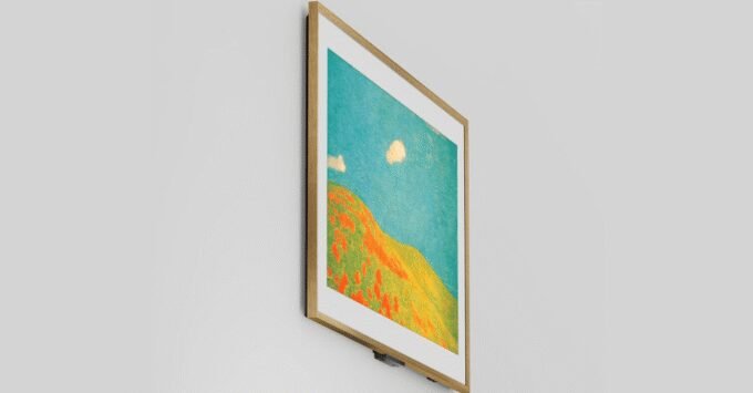 A sleek Art TV displaying a classic painting, seamlessly integrated into a modern living room with minimalist decor.