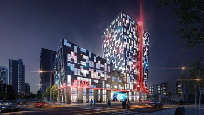 A conceptual rendering of an Atari-themed hotel exterior, possibly with retro gaming elements and a futuristic design.