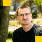 Jesse Pollak, creator of Coinbase's Base blockchain, speaking at an event.