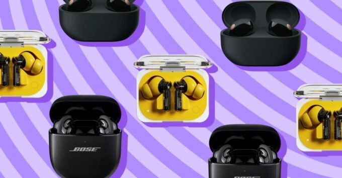 A selection of modern true wireless earbuds displayed on a clean surface, representing the best audio technology of 2026.