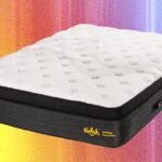 A side sleeper comfortably resting on a supportive Nolah Evolution mattress, highlighting proper spinal alignment and pressure relief.