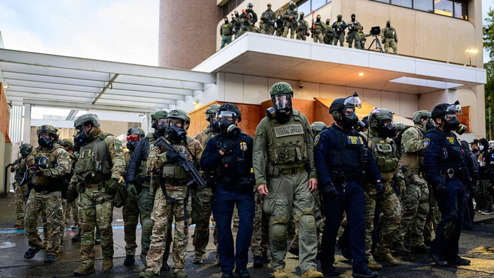 Federal agents clash with anti-ICE protesters outside a U.S. Immigration and Customs Enforcement building in Portland, Oregon.