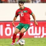 Brahim Diaz en pleine action avec le maillot des Lions de l'Atlas lors de la Coupe d'Afrique des Nations 2025.