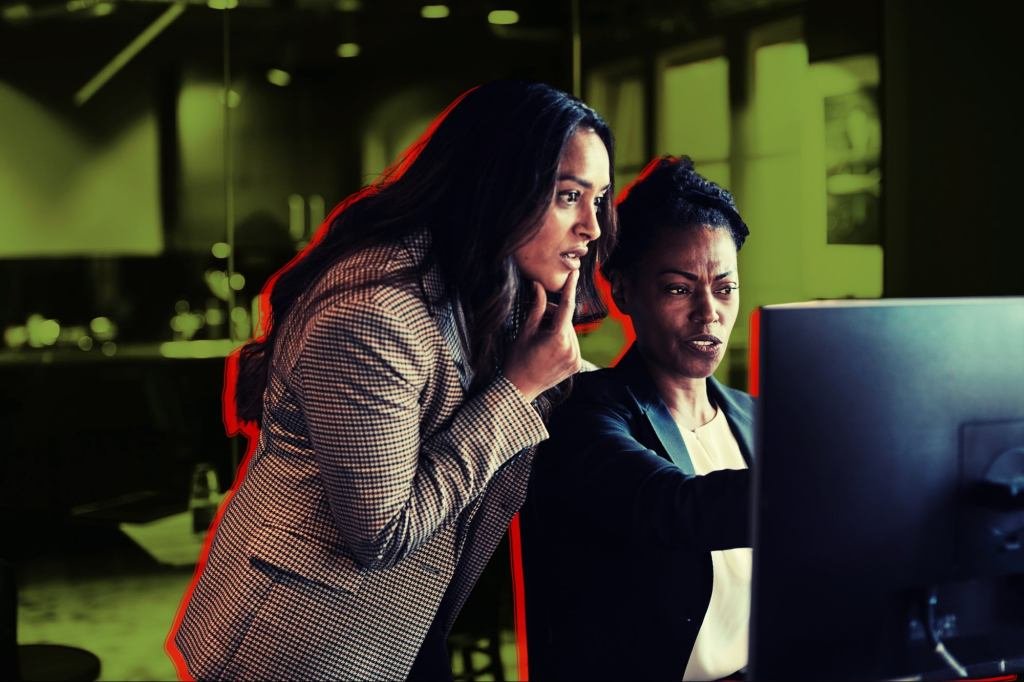 A diverse group of business professionals collaborating in a modern office setting, symbolizing strategic planning and future growth.