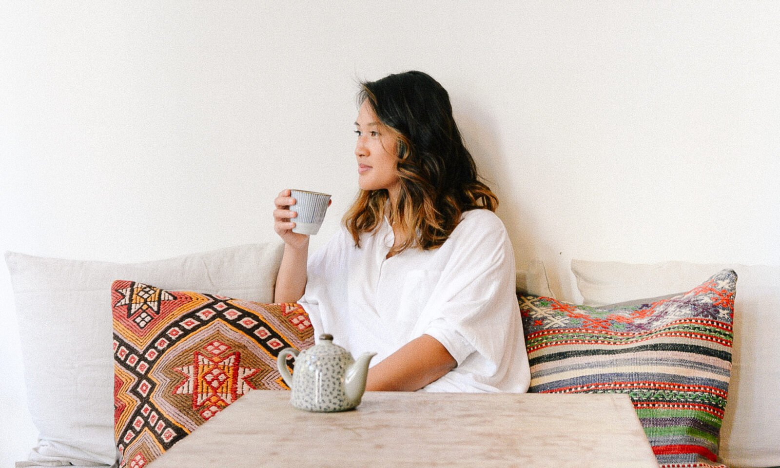 A steaming cup of coffee or tea, symbolizing the energizing and metabolic benefits of caffeine.