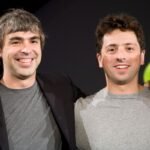 Sergey Brin and Larry Page, co-founders of Google, standing together.