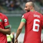 Joueurs de l'équipe nationale de football du Maroc, les Lions de l'Atlas, sur le terrain.