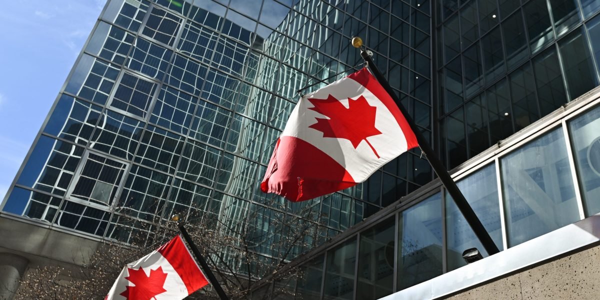 A dynamic chart illustrating the upward trend of the Canadian S&P/TSX Composite Index, with symbolic representations of mining, finance, and technology sectors.