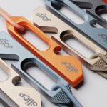The 15 Collection by Herbst Produkt and Slice, showcasing the Spry multi-tool and Snapr carabiner with ceramic safety blades.